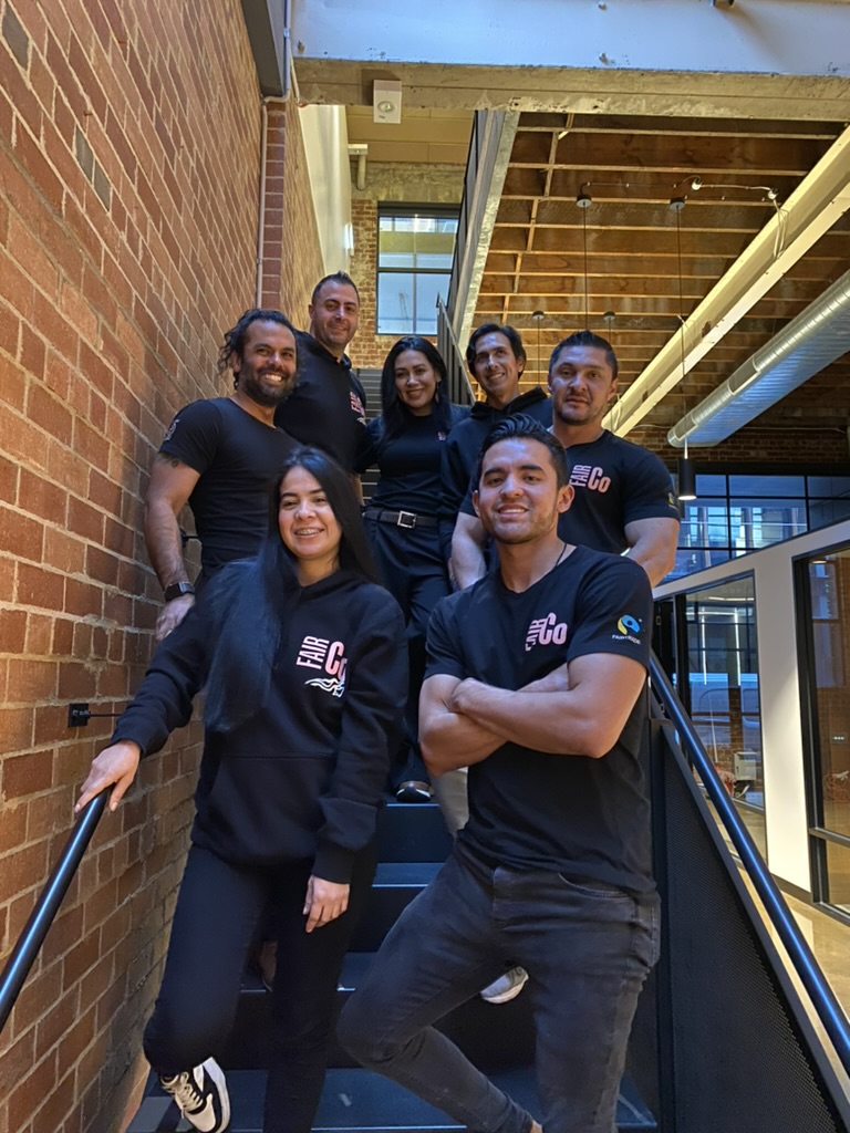 Fair Company commercial cleaning team inside a Melbourne office building, professional office and commercial cleaners standing on staircase